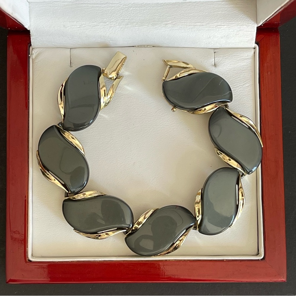 Vintage gold tone thermoset moonglow lucite Bracelet.